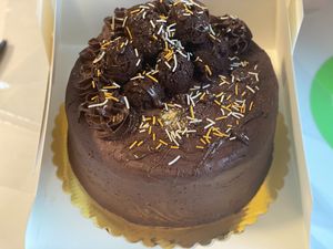 GF Chocolate cake, chocolate frosting, filled with “Nutella”, & topped with edible GF chocolate cookie dough.  at GG's Vegan Bakery in Bozrah