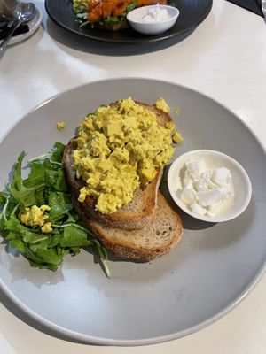 Scramble tofu on sourdough ($12) add vegan feta ($3.5)  at Picnic Cafe in Hobart