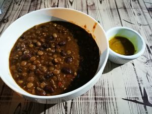 Chilli sin carne with hot sauce at Jammin Comunidad Vegana in Puerto Viejo De Talamanca