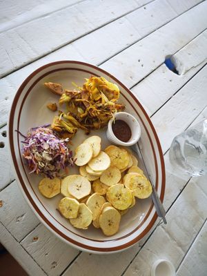 Jerk jackfruit with plantain chips and coleslaw salad at Jammin Comunidad Vegana in Puerto Viejo De Talamanca