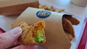 Fresh and bright green avocado inside avocado fry at Beesechurgers in The Hague