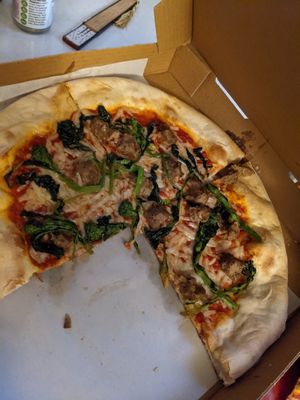 I couldn't wait to eat so the picture is missing a slice. at D'Matteos Pizza & Grill in Ronkonkoma