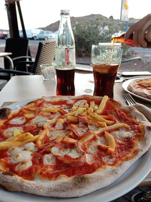 Vegan pizza with bacon at Chris Kitchen in Fuerteventura