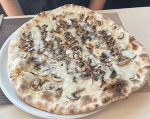 Vegan Pizza with vegan mozzarella, mushrooms and truffle  at Chris Kitchen in Fuerteventura