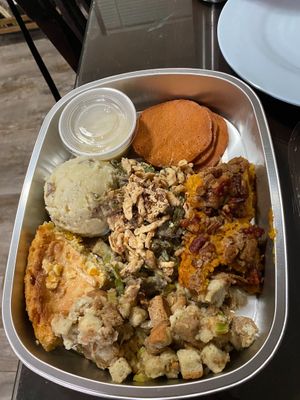 Pictured is their Christmas meal from this past holiday (This was one serving 😧) 
 at Under the Ground Blono in Downs