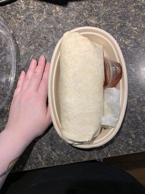 Huge Nashville hot chick’n burrito  at Under the Ground Blono in Downs