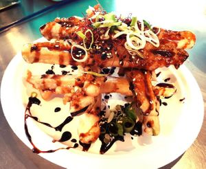Eggplant chips, sesame seeds, spring onion, tagarashi threads, coconut soy caramel at Good Peace in Birtinya