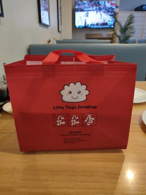 Cute little to go bags at Little Ting’s Dumplings in Seattle