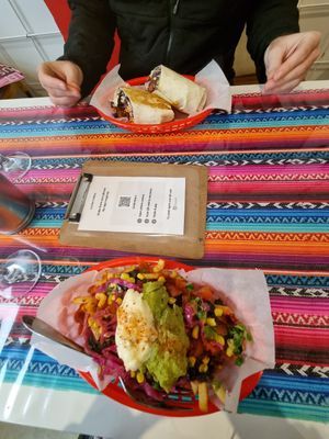 Loaded fries with frijoles (front) at Cocina Comida in Adelaide