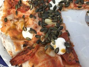 Spicy pizza with pineapple and vegan cheese at Sundlingska Gården in Tavelsjo