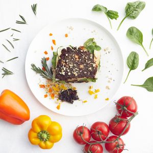 Rawsagna - Herb Cheese and Marinara layered between Zucchini noodles and Baby Spinach and our delicious Marinated Mushrooms.  Amasing! at Sprightly in Vancouver