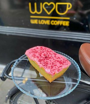 Vegan lemon pound cake with raspberry glaze (naturally colored!) at We Love Coffee in Leuven