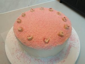 Vegan pina colada cake with coconut filling and frosting pineapple filling with white choco hearts at We Love Coffee in Leuven