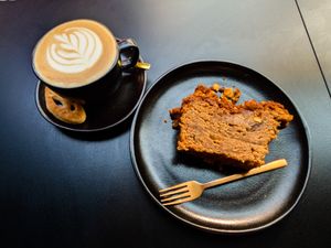 Capuccino with Oat Milk and vegan Banana Bread at We Love Coffee at We Love Coffee in Leuven