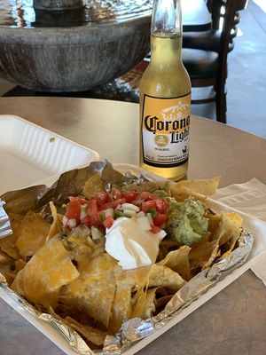 Nachos with Pico de Gallo salsa, guacamole, and sour cream  at Buenos Grill in Reno