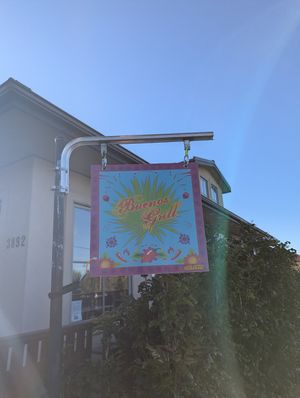 Signage out front with their logo at Buenos Grill in Reno