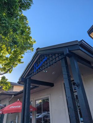 Neon sign at front door on the patio at Buenos Grill in Reno