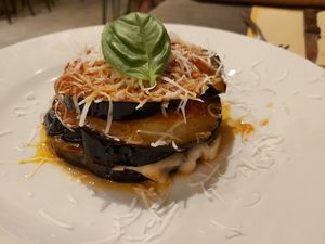 Baked eggplant with  vegan mozzarella at Osteria Casa Pepe in Trieste