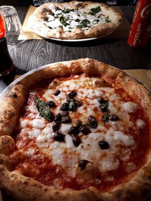 Pizza Margherita with rice mozzarella and Olives at Osteria Casa Pepe in Trieste