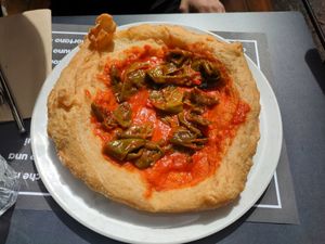 Montanara di pizza fritta con peperoni at Osteria Casa Pepe in Trieste