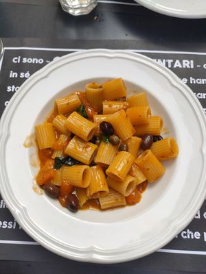 Mezze maniche con pomodori gialli del Cilento, olive taggiasche, capperi at Osteria Casa Pepe in Trieste