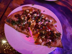 Vegan Mediterranean pizza at Rise and Shine Cabaret Cafe in Parkland
