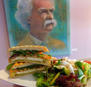 Tomato mozzarella panini with extra greens at Opera Café & Coffeehouse in Austin