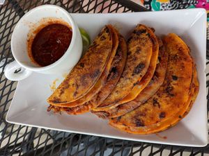 Birria tacos plate. at Opera Café & Coffeehouse in Austin
