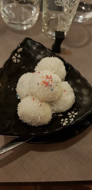 Rice balls with coconut flour and sesame sauce at Shoku in Treviso