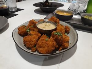 Crispy Cauliflower with charred pineapple aioli dipping sauce. at Belse in Dallas