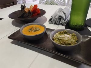 Texas Classic Guac & Cheese with tri-color chips at Belse in Dallas