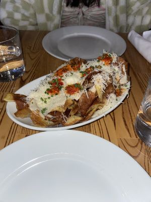 Truffle Chips: gourmet cheese fries with a perfect zing & spice.  at Pura Vita in Redondo Beach