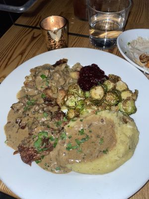 Thanksgiving feast: moist and flavorful jackfruit turkey & buttery mashed potatoes covered in a perfectly salted gravy. Some of the best Brussels sprouts I’ve had. (seasonal)   at Pura Vita in Redondo Beach