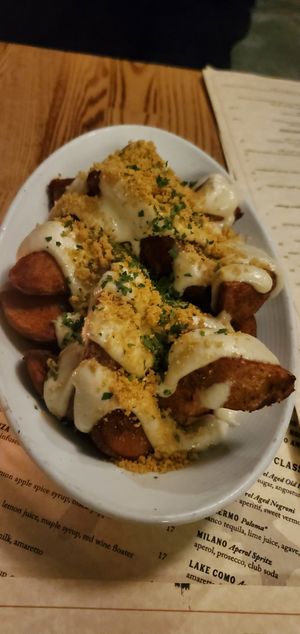 Garlic Parmiagiano Potato Wedges at Pura Vita in Redondo Beach