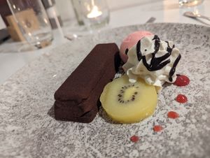 Hazelnut and kiwifruit dessert at Tītī Restaurant in Dunedin