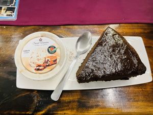 Vegan chocolate cake with ice cream   at Sweeties by Celia in Samara