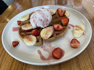 Waffle - so hard I couldn’t always cut through it  at Soul Sisters Café in Camberwell