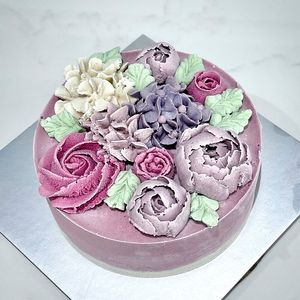 Customised single tier bespoke floral bouquet raw vegan wholesome plant cake.'Artisanal 100% hand crafted and designed. at Cake Botanica in Central Singapore