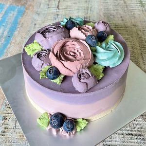 Customised single tier bespoke luscious blueberry and strawberry raw vegan cake 100% natural fruit based. Artisanal hand crafted and designed. at Cake Botanica in Central Singapore