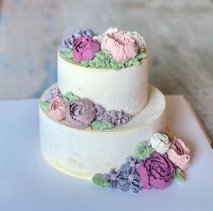 Artisanal raw vegan 2-tier wedding cake. 100% hand crafted rosettes and florals. Custom designed. at Cake Botanica in Central Singapore