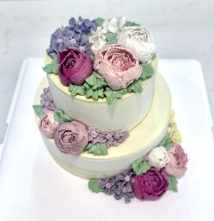 Bespoke 2-tier raw wedding cake. Luxury whole-fruit pure vegan cake with 100% handcrafted ingredients and design, at Cake Botanica in Central Singapore