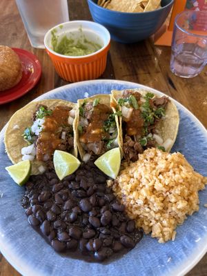 Carnitas tacos with beans and rice    at Sugar Taco in Sherman Oaks