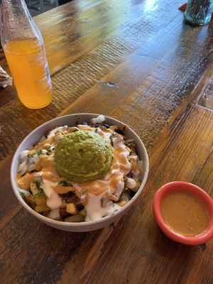 Loaded fries with jackfruit, which tasted like barbecue sauce, not good. The best thing in this photo is the habanero salsa, yum.  at Sugar Taco in Sherman Oaks