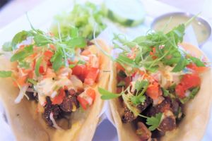 Avocado Tacos: corn tortilla, smoked paprika cornmeal
crusted avocado, chipotle-mango cream, pico de gallo, red radish, salsa verde
 at Candle Cafe in New York City