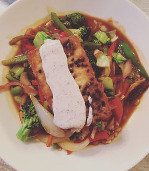 Miso stir fry- sesame crusted tofu, seasonal vegetables, brown rice, sriracha-miso sauce, arame coulis. at Candle Cafe in New York City
