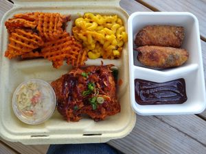 Bbq plate with egg rolls at Pure Soul in Durham