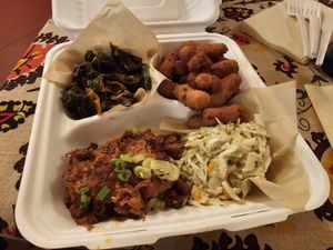 Eastern BBQ Platter w/ Bilbo's Greens and hushpuppies at Pure Soul in Durham