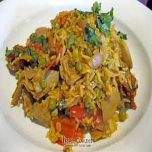Wild Rice and Cremini Risotto Croquettes with Shiitake mushrooms, roasted red pepper puree, asparagus and French lentils. at Caravan of Dreams in New York City