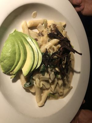  Cashew lemon pasta (gluten free) : asparagus , artichoke , sun dried tomato , capers, shiitake bacon, served with gluten free pasta in a smoky cashew lemon cream. Finished with s  at Caravan of Dreams in New York City