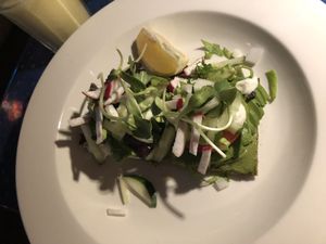 Raw Avo wild green sandwich (gluten free)- raw almond hummus and raw pesto fresh tomato and raw Ali oli with mix greens, onions, radish and sprouts   at Caravan of Dreams in New York City